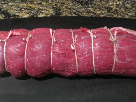 Rolled & tied flank steak ready to brown
